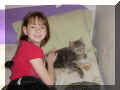 Click here to see pictures of me around the house with my family and pets.