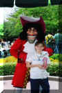 Me and Captain Hook from "Peter Pan" - he's bad in the movie, but he was nice to me.