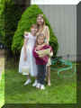 Me and my sister and my friend hugging on Easter.